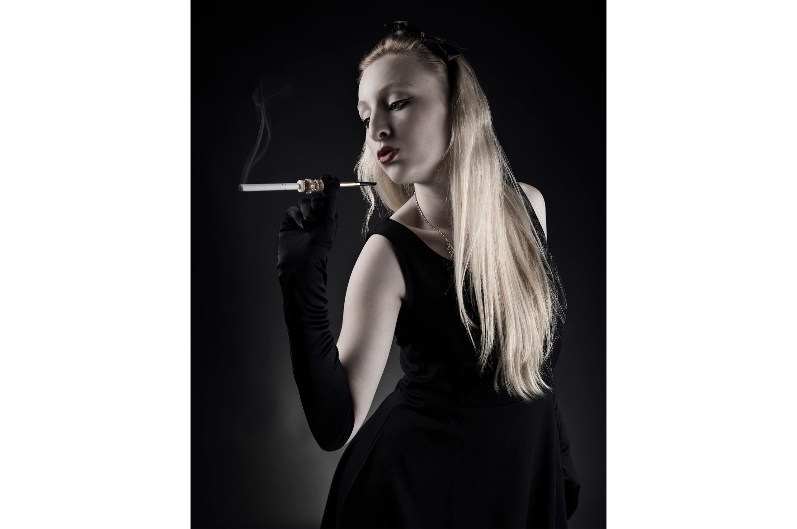 (After Editing) Photograph of model with long cigarette and black dress